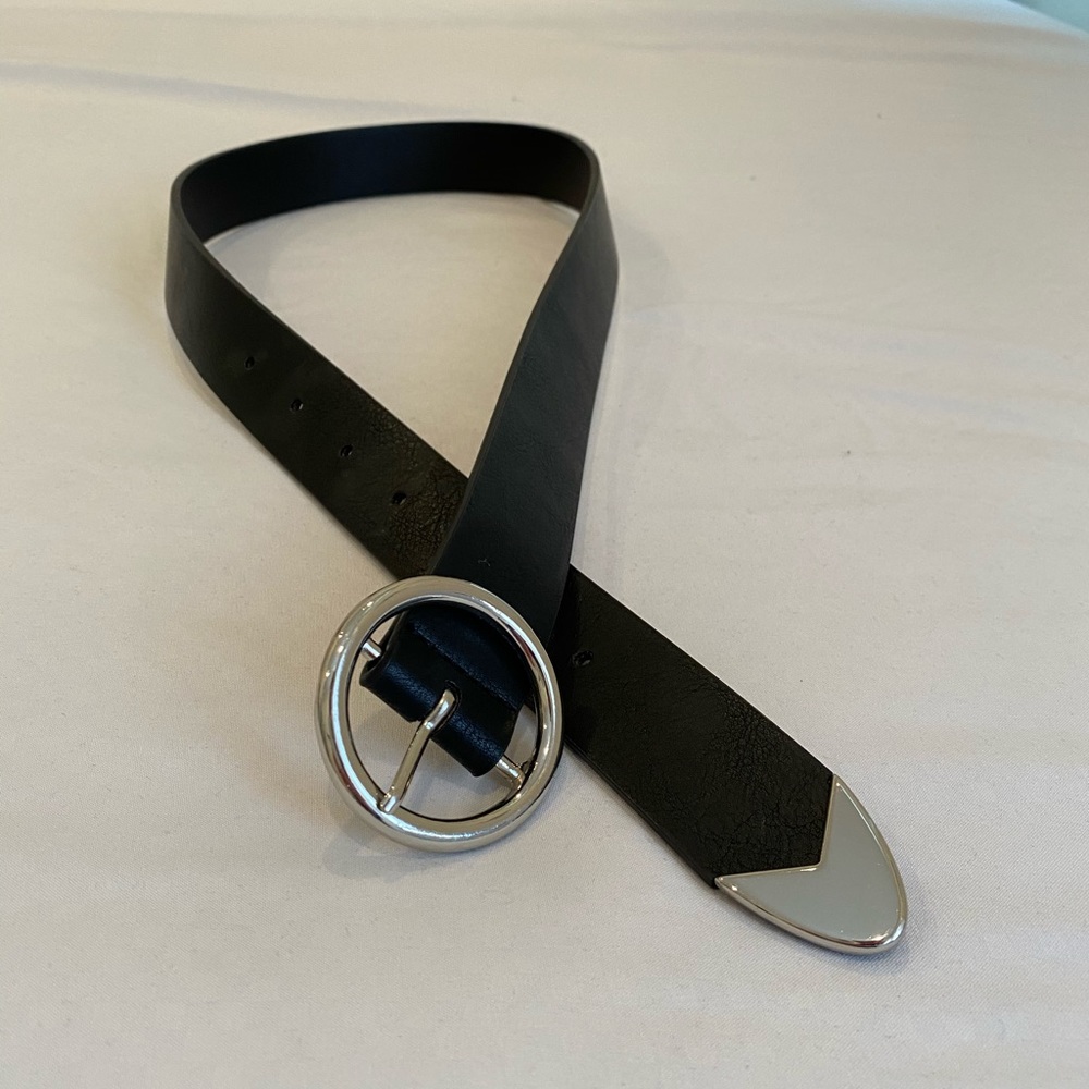 Black belt with silver circle buckle